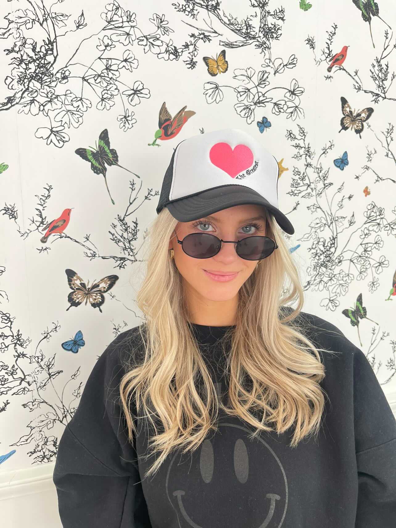 The Greatest is Love Trucker Hat